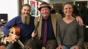 Inside, three people sit together; one holds a guitar, another a flute, and the third smiles. They've gathered for "Booked for Lunch," an engaging conversation event set for March 10 at the Milton Public Library.